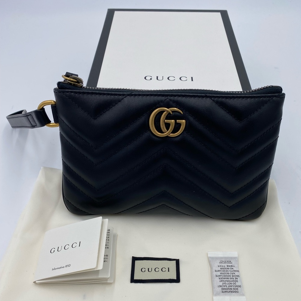 Women’s Gucci GG Marmont quilted Leather wrist pouch made in Italy